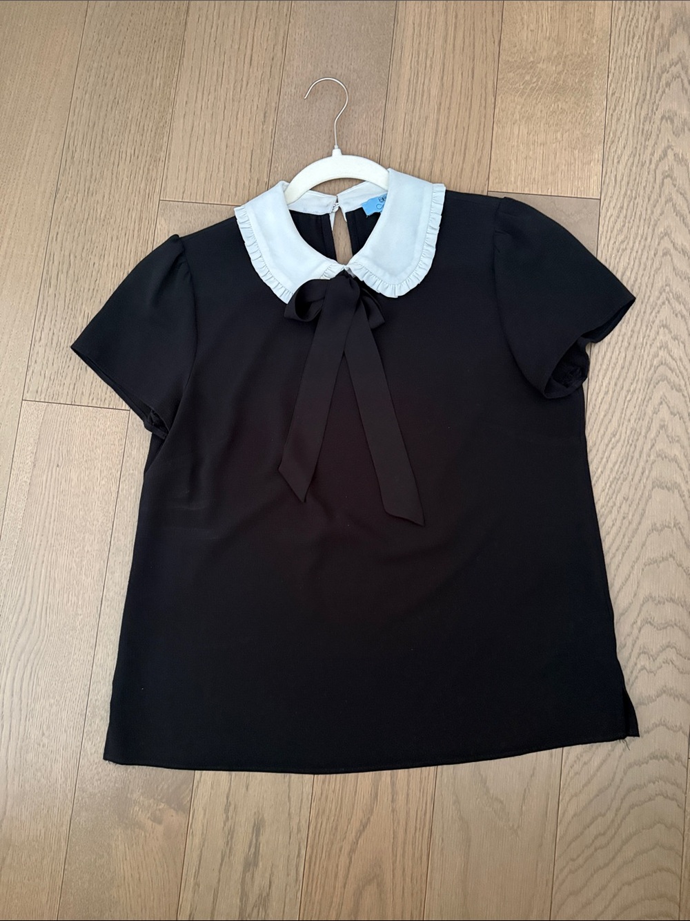 CeCe Black Blouse with White Peter Pan Collar and Bow